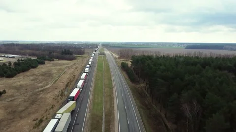 The queue at the border with the EU. A large congestion of trucks at customs. Video stock 236940587