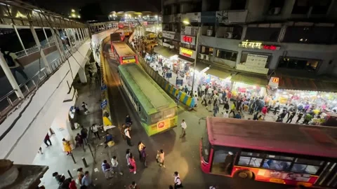 Queue of Bus passing at Thane station. Rush hour traffic in Mumbai. Stock Footage 237158700