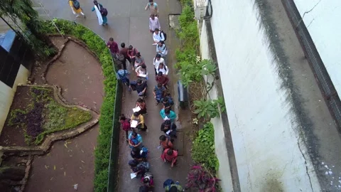 Queue of diverse college students are entering in campus for examination. Stock Footage 208584490