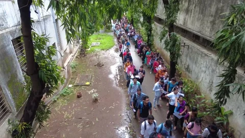 Queue of diverse college students are entering in campus for examination. Stock Footage 218827989