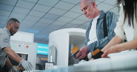 Queue of Diverse People, Passengers Putting Personal Items, Luggage for X-ray Video stock 306785954