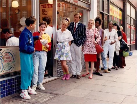 A Queue At A Fish And Chip Shop. Stock Photos