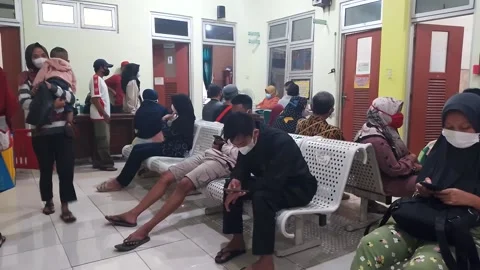 Queue at the health clinic Video stock 209185606