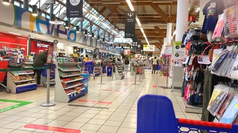 Queue line separates buyers to stay in 2 meters close to each other Stock Footage 128253231