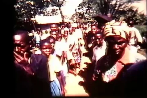 Queue of locals waiting to pay their school free - 1974 Stock Footage 106621101