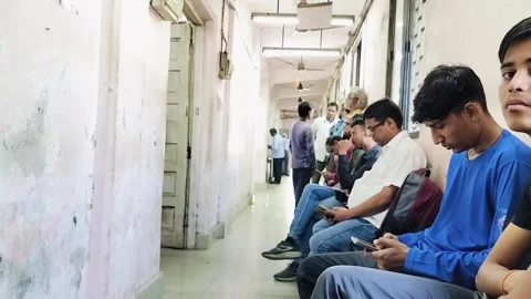 Queue men waiting goverment work Stock Footage 294230572