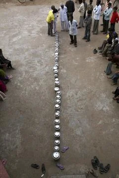Queue of milk cans to deposit milk at collection centre of Gujarat Co-oper... Stock Photos