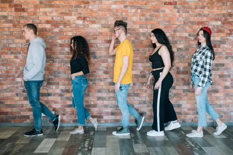 Queue millennial standing waiting people diversity Stock Photos