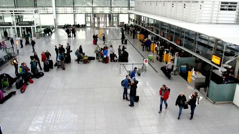 Queue at the Muich airport check in counter Stock Footage 72249879