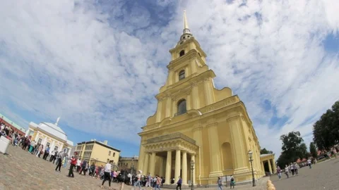 The queue at the Orthodox church, clouds ove the spire of St. Peter and Paul Video stock 71631365