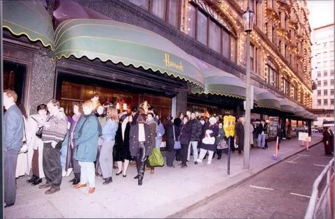 Queue Outside Harrods Today Where Actor Pierce Brosnan Opened The Sale. (for Ful Stock Photos
