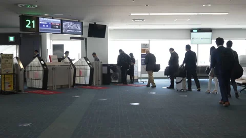 Queue Of Passengers Boarding The Plane At Boarding Gate Of Haneda Airport Stock-Footage 156385369
