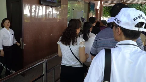 The queue of people. A crowd of people moving to the turnstile. Passengers si Stock Footage 120108334