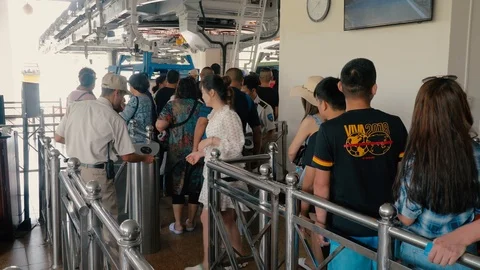 The queue of people. A crowd of people moving to the turnstile. Passengers si Stock Footage 121210359