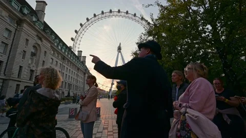 The queue to see The Queen lying in state stopped by The London Eye Stock Footage 212687995