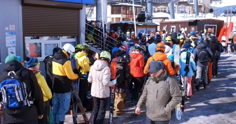The queue of skiers and tourists in front of the ski lift Stock Footage 207002893