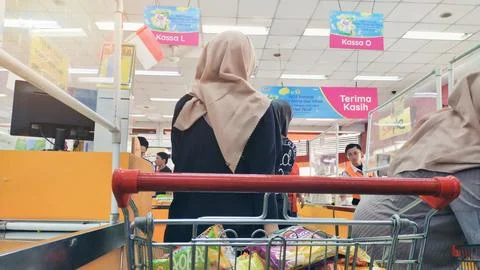 Queue at the supermarket cashier Stock Photos