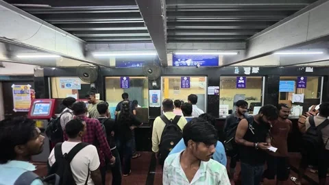 Queue at Ticket Counter in Crowded Transit Station 4K Video Stock Footage 339062459