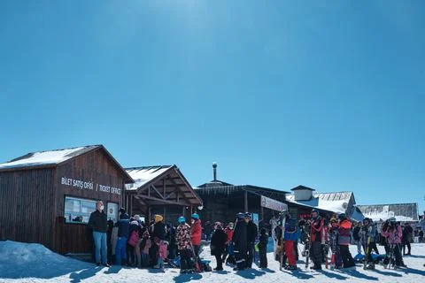 Queue to ticket sales office at ski resort Stock Photos