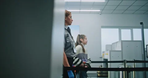 Queue of Travelers Waiting for TSA Screening Procedures, Airport Staff Checking Video stock 306717918