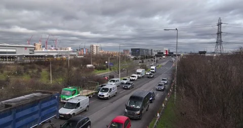 Queue of various vehicles on highway exit ramp at suburbs Stock Footage 170907587