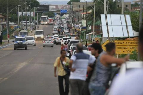  queue of vehicles to access the ferry boat system itaparica, bahia, brazi... Stock Photos