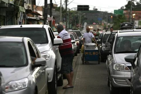  queue of vehicles to access the ferry boat system itaparica, bahia, brazi... Stock Photos