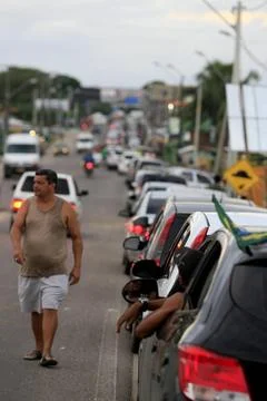  queue of vehicles to access the ferry boat system itaparica, bahia, brazi... Stock Photos