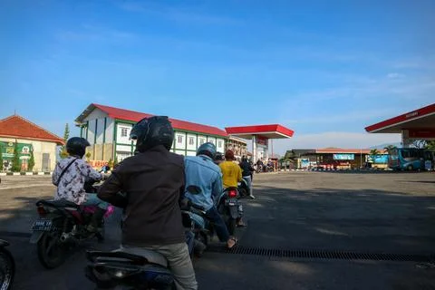 Queue of vehicles refueling at Pertamina Gas Station Stock Photos