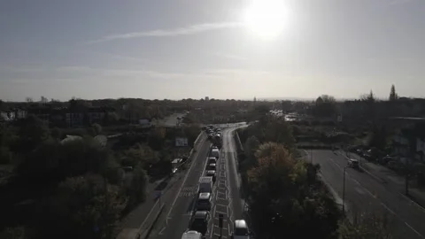 Queue of vehicles waiting at large roundabout Stock-Footage 167946949