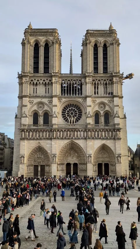 Queue to visit the newly renovated and splendid Notre-Dame Cathedral in Paris. Stock Footage 305416118