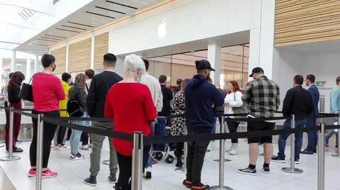 Queuing in a Busy Apple Store Stock Photos