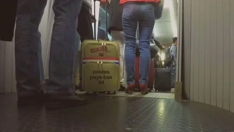 Queuing On Plane Arm To Get Into Plane Stock Footage 74738889