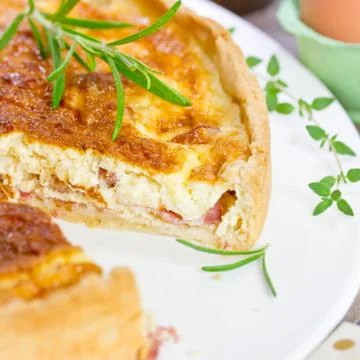 Quiche with thyme on a plate Foto stock