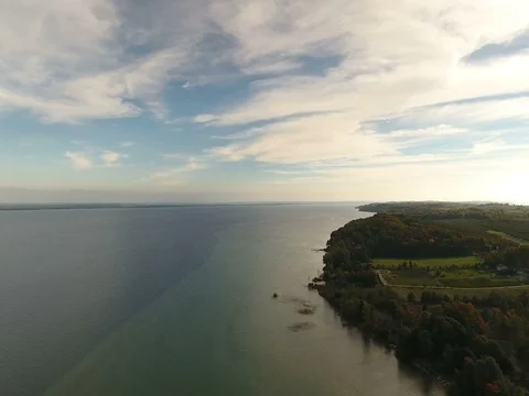 Quick Aerial pan over Lake Michigan to peninsula Vineyards Stock Footage 76014901