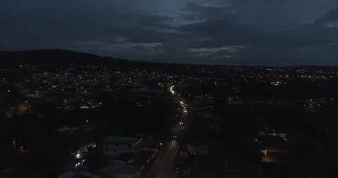 Quick aerial shot circles around Savanitas, Panama at night 스톡 동영상 99977087