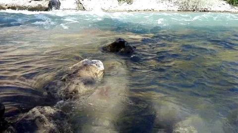 Quick and cool river Ugam in mountain Tashkent Stock Footage 78877893