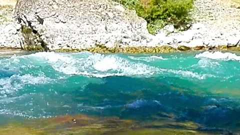 Quick and cool river Ugam in mountain Tashkent Stock Footage 78879382
