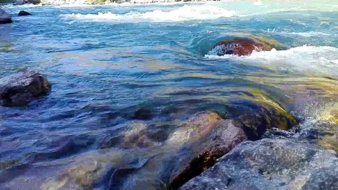 Quick and cool river Ugam in mountain Tashkent Stock Footage 79049712