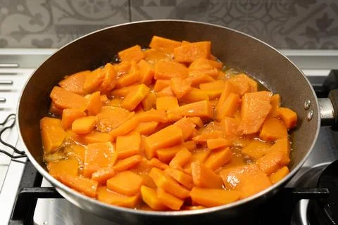 A quick and easy side dish: pan-fried pumpkin. Stock Photos