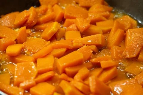 A quick and easy side dish: pan-fried pumpkin. 스톡 사진