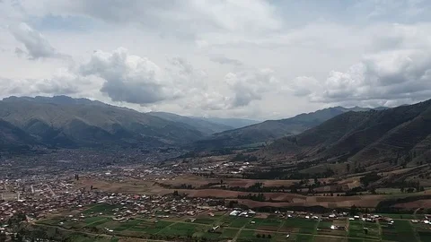 Quick and panoramic view of the small town and crops. Stock Footage 98510905