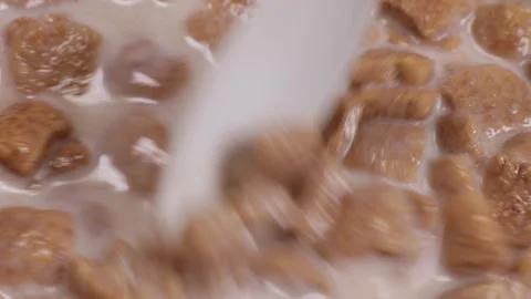 Quick breakfast, corn pads with milk stir spoon Stock Footage 243722975