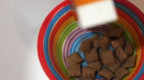 Quick breakfast pour into a bowl Video stock 49823793