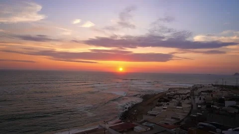 Quick camera of a beautiful and incredible orange sunset on the beach with a Stock Footage 185342549