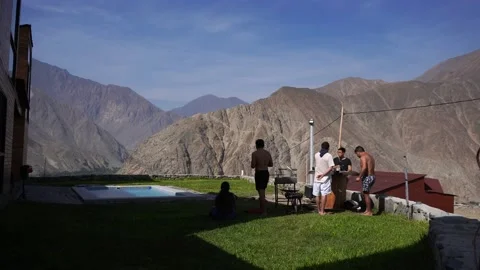 Quick camera of friends eating barbecue and drinking outdoors in a country house Stock Footage 199636340