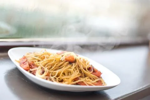 Quick dinner idea - takes 15 minutes - Italian spaghetti pasta with herbs, to Stock Photos