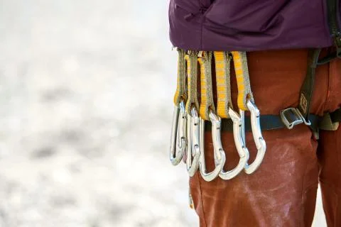 Quick-draws on the  climber's harness Stock Photos