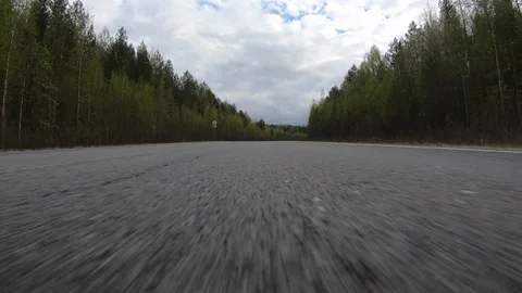 A quick drive away.Forest road.Need for speed. Video stock 110391218