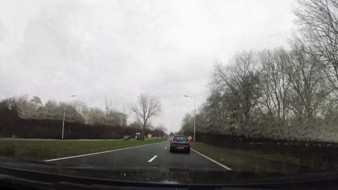 Quick drive with car in town. 2.7 K Stock Footage 107987974